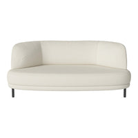 Cream-colored curved sofa with a smooth fabric texture and minimalist design, perfect for modern decor.