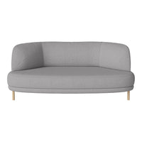 Curved gray sofa with a smooth texture and light wooden legs, perfect for modern living spaces.
