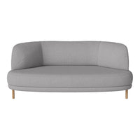 Gray curved sofa with a smooth texture and light wood legs, perfect for modern interiors.