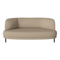 Beige curved sofa with a smooth texture and minimalist design, featuring a contemporary style. Ideal for modern decor.