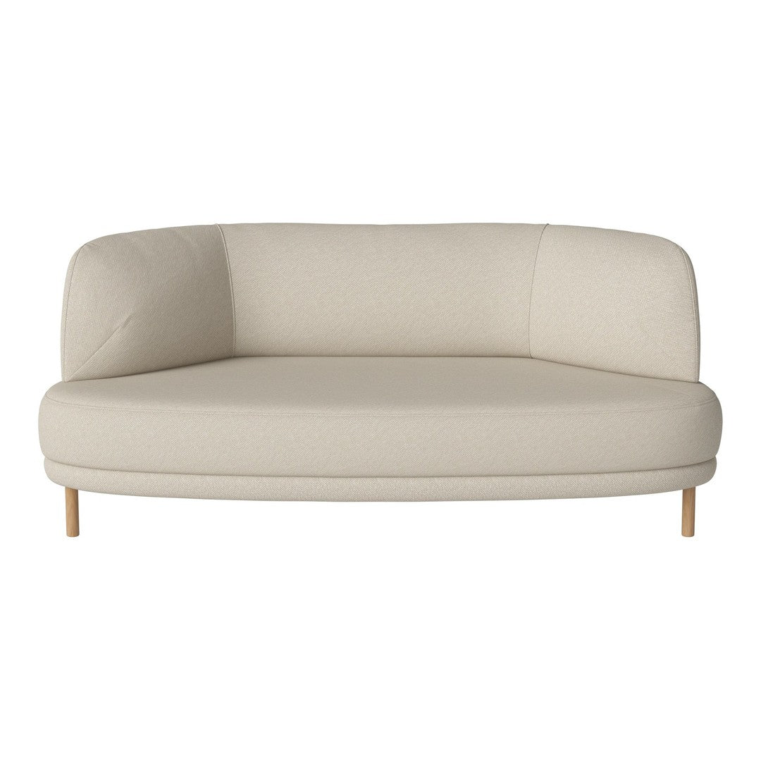 Beige curved sofa with a minimalist design and natural wooden legs, offering a modern and cozy aesthetic.