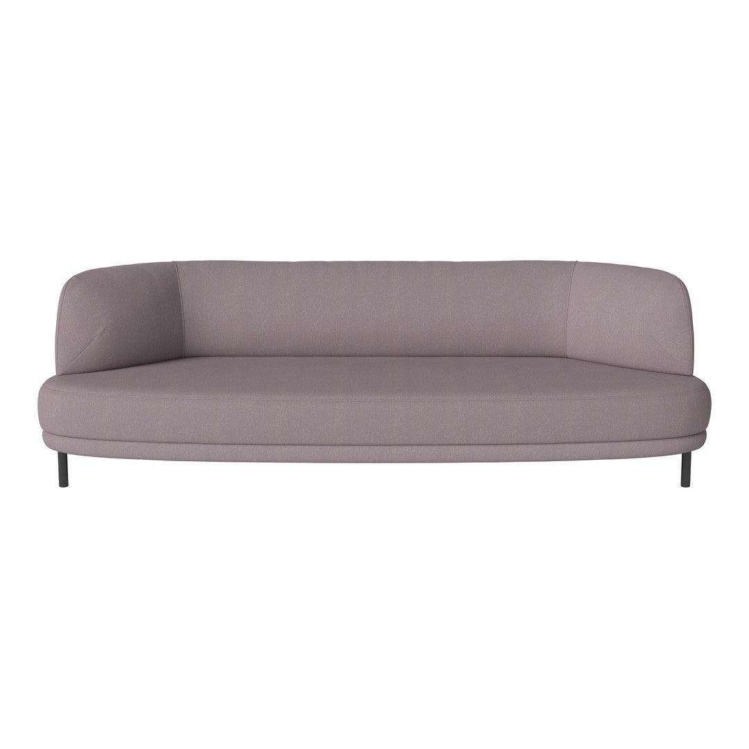 Modern curved sofa in soft lavender fabric with a smooth, minimalist design and sleek black legs.