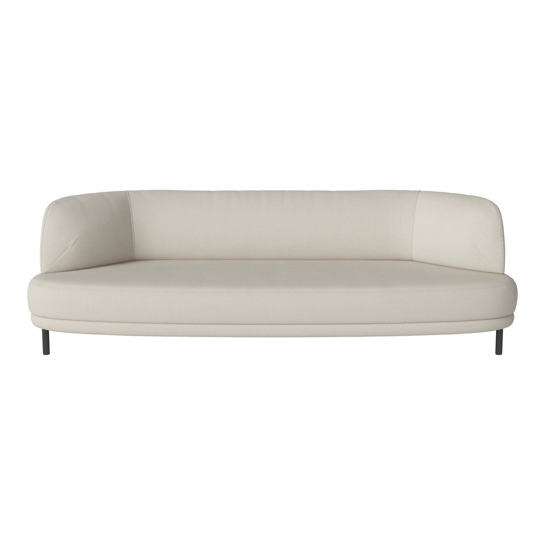 Beige curved sofa with smooth texture and minimalist design on black legs. Ideal for modern home decor.