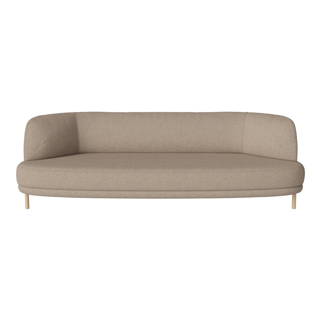 Beige curved sofa with minimalist design and soft fabric texture, perfect for modern living spaces.