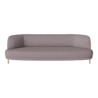 Soft lavender sofa with a smooth fabric finish and rounded edges, featuring light wooden legs.