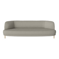 Light gray curved sofa with a smooth fabric finish and wooden legs, perfect for modern living spaces.
