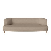 Beige rounded sofa with a smooth texture and light wooden legs, featuring a minimalist design.