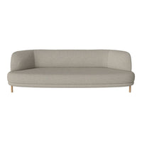 Light gray curved sofa with a minimalistic design and natural wood legs, perfect for modern interiors.