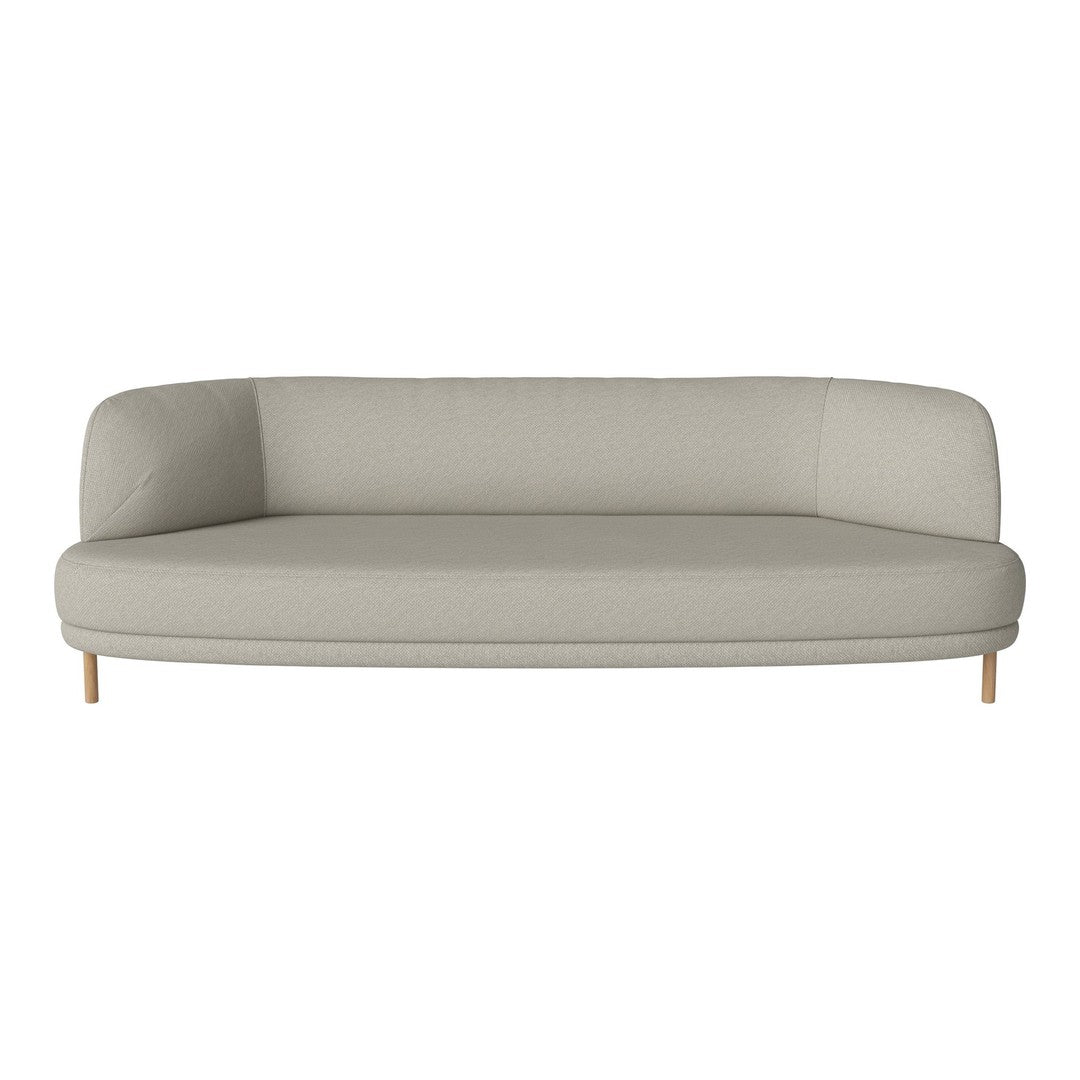 Light gray curved sofa with a smooth texture and wooden legs, perfect for modern living spaces.