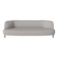 Modern gray sofa with a sleek, curved design and minimalistic style, perfect for contemporary living spaces.