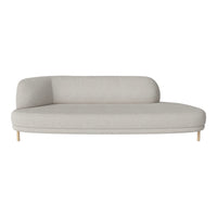 Light gray curved sofa with a minimalist design and smooth fabric texture, featuring wooden legs.