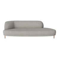 Light gray curved sofa with a smooth fabric texture and natural wood legs, perfect for modern living spaces.