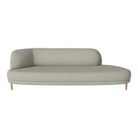 Light gray modern sofa with smooth, sleek lines and minimalist design, featuring a subtle textured fabric.