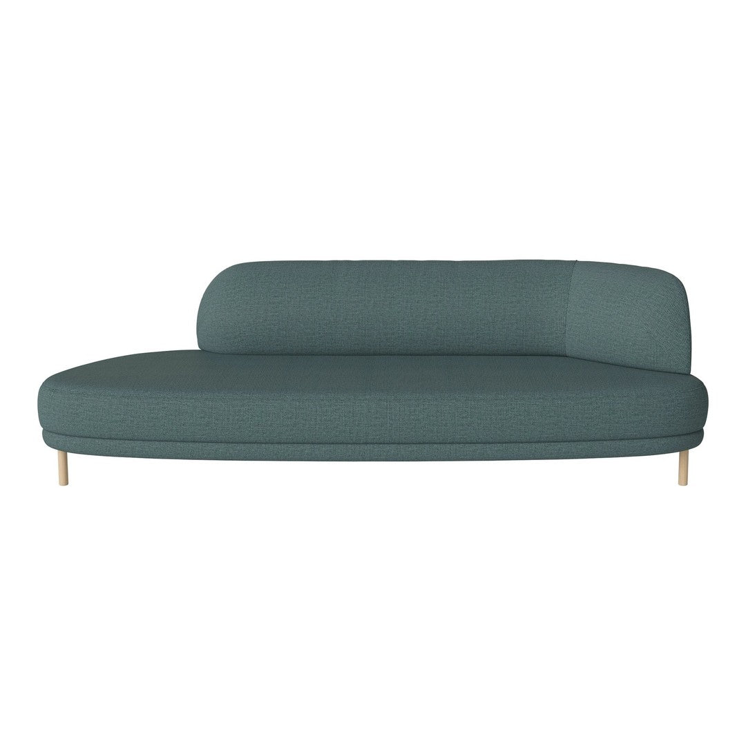 Curved teal sofa with a smooth texture and light wooden legs. Modern design for stylish interiors.