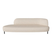 Beige curved sofa with a smooth fabric texture, featuring minimalist design and black metal legs. Ideal for modern decor.