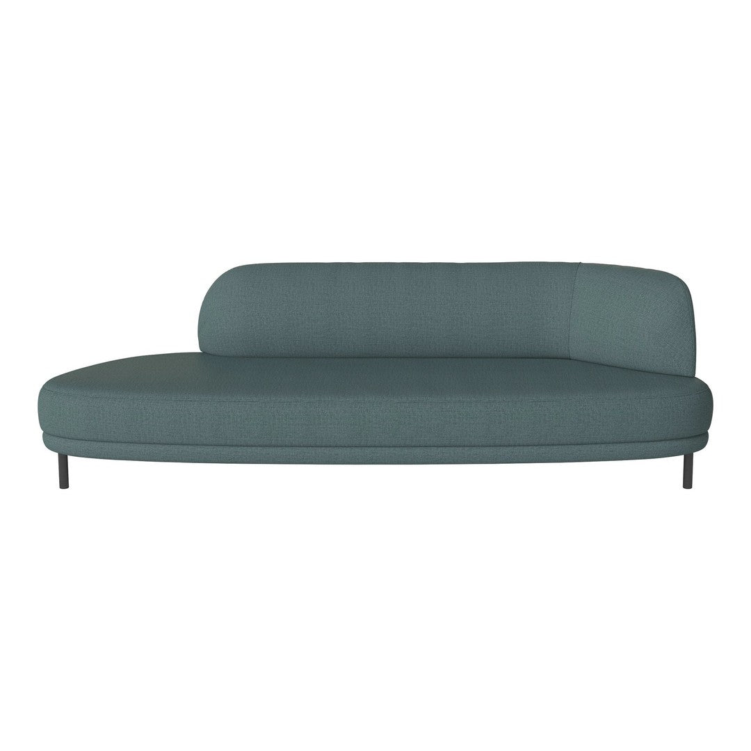 Teal curved sofa with minimalist design and smooth fabric texture, perfect for modern interiors.