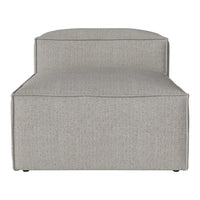 Gray upholstered chaise lounge with a minimalist design and subtle texture pattern. Ideal for modern decor.
