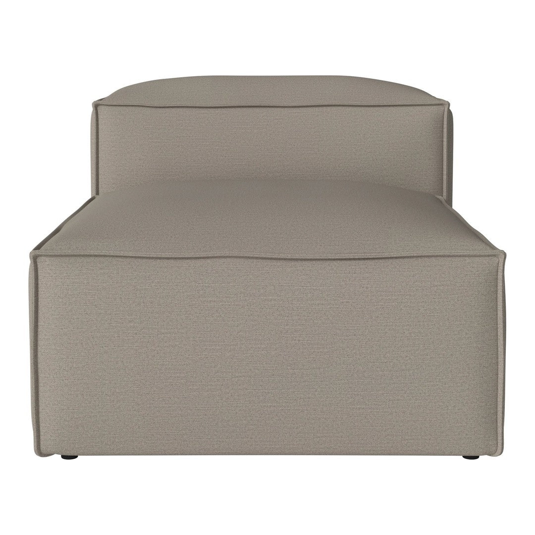 Light taupe chaise lounge with a smooth, textured fabric, featuring clean lines and a minimalist design.