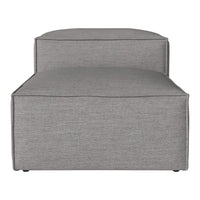 Gray upholstered chaise lounge with a smooth, textured fabric in a minimalist design.