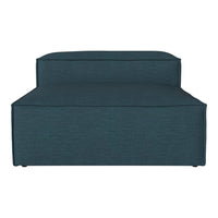Teal upholstered lounge chair with a smooth texture and sleek, minimalist design. Perfect for modern interiors.
