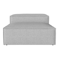 Gray textured fabric chaise lounge with a minimalist design, featuring subtle woven patterns.