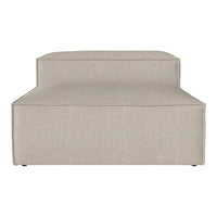 Beige upholstered sofa with a smooth, textured fabric and a minimalist design. Perfect for modern living spaces.