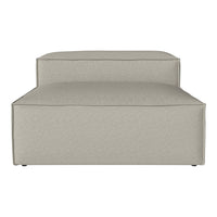 Light gray modular sofa with a minimalist design and smooth, textural fabric. Perfect for modern interiors.