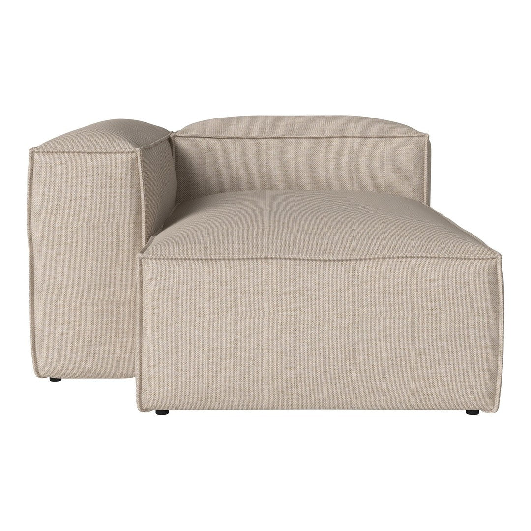 Beige sectional sofa with subtle textured pattern, featuring clean lines and a contemporary design.