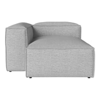 Gray modular sofa with a textured pattern, featuring clean lines and a modern aesthetic. Perfect for contemporary decor.