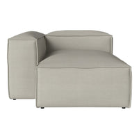Light beige upholstered couch with a minimalist design and subtle texture patterns.