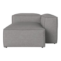Gray fabric chaise lounge with a simple, modern design and clean lines. Ideal for contemporary interiors.