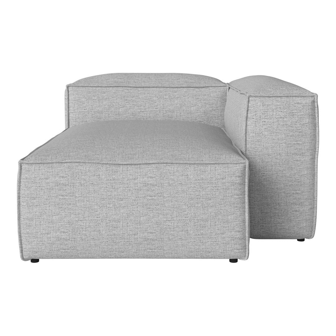 Light grey upholstered sectional sofa with a textured pattern, featuring clean, modern lines and a minimalist design.