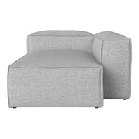 Light grey upholstered sectional sofa with a textured pattern, featuring clean, modern lines and a minimalist design.
