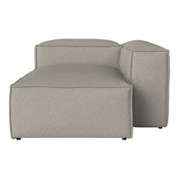 Soft gray modular sofa with smooth, minimalist design and subtle textured fabric pattern. Perfect for modern interiors.