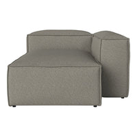 Gray textured chaise lounge with a modern, minimalist design and clean lines. Perfect for contemporary interiors.