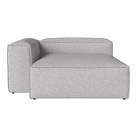 Light gray modular sofa in a minimalist design with a textured fabric finish and clean lines. Perfect for modern decor.