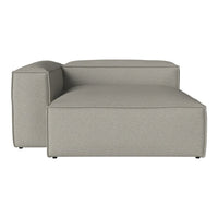 Gray sectional sofa with a minimalist design and a smooth, textured fabric pattern. 