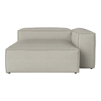 Light grey sectional sofa with a subtle ribbed texture, featuring clean lines and a minimalist design.