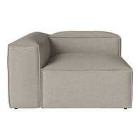 Light gray upholstered sofa with a smooth, textured surface and minimalist design. Perfect for modern decor.