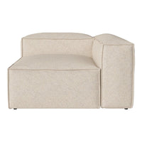Beige modular couch with a textured fabric pattern, featuring clean lines and a modern design.
