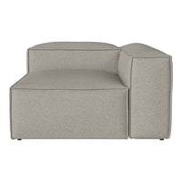 Light gray sectional sofa with a minimalist design and subtle texture pattern. Modern and versatile for any decor.