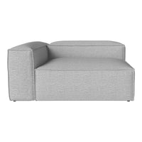Gray sectional sofa with a modern, minimalist design and textured fabric. Perfect for contemporary living spaces.