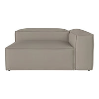 Beige modular sofa with minimalist design and smooth, clean lines, perfect for modern living spaces.
