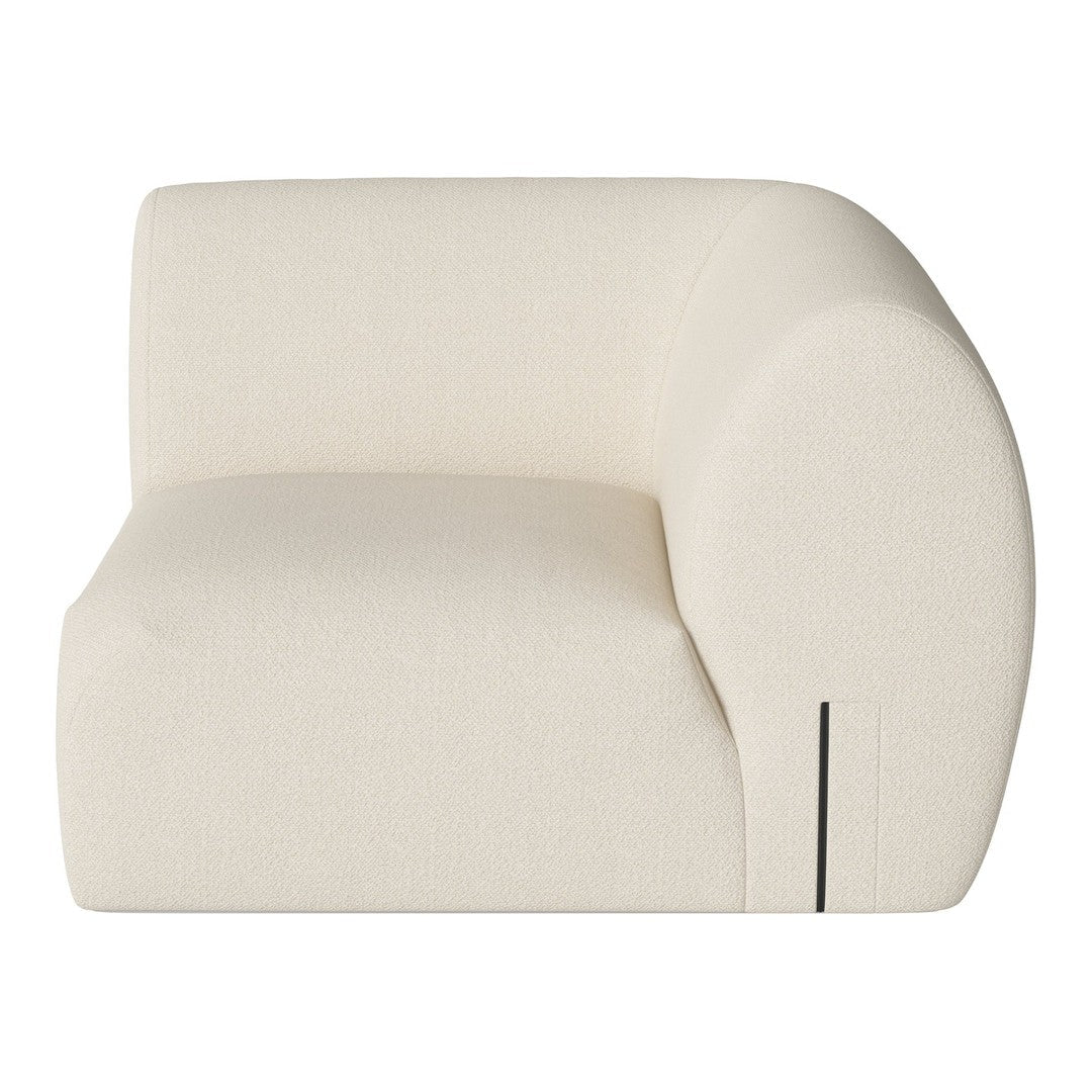 Cream-colored upholstered armchair with smooth curves and a subtle texture, featuring a minimalist black accent line.