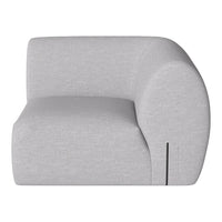 Light gray minimalist armchair with soft, smooth texture and curved shapes, perfect for modern living spaces.