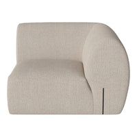 Beige curved sofa section with a textured finish and minimalist black detailing. Ideal for modern interiors.