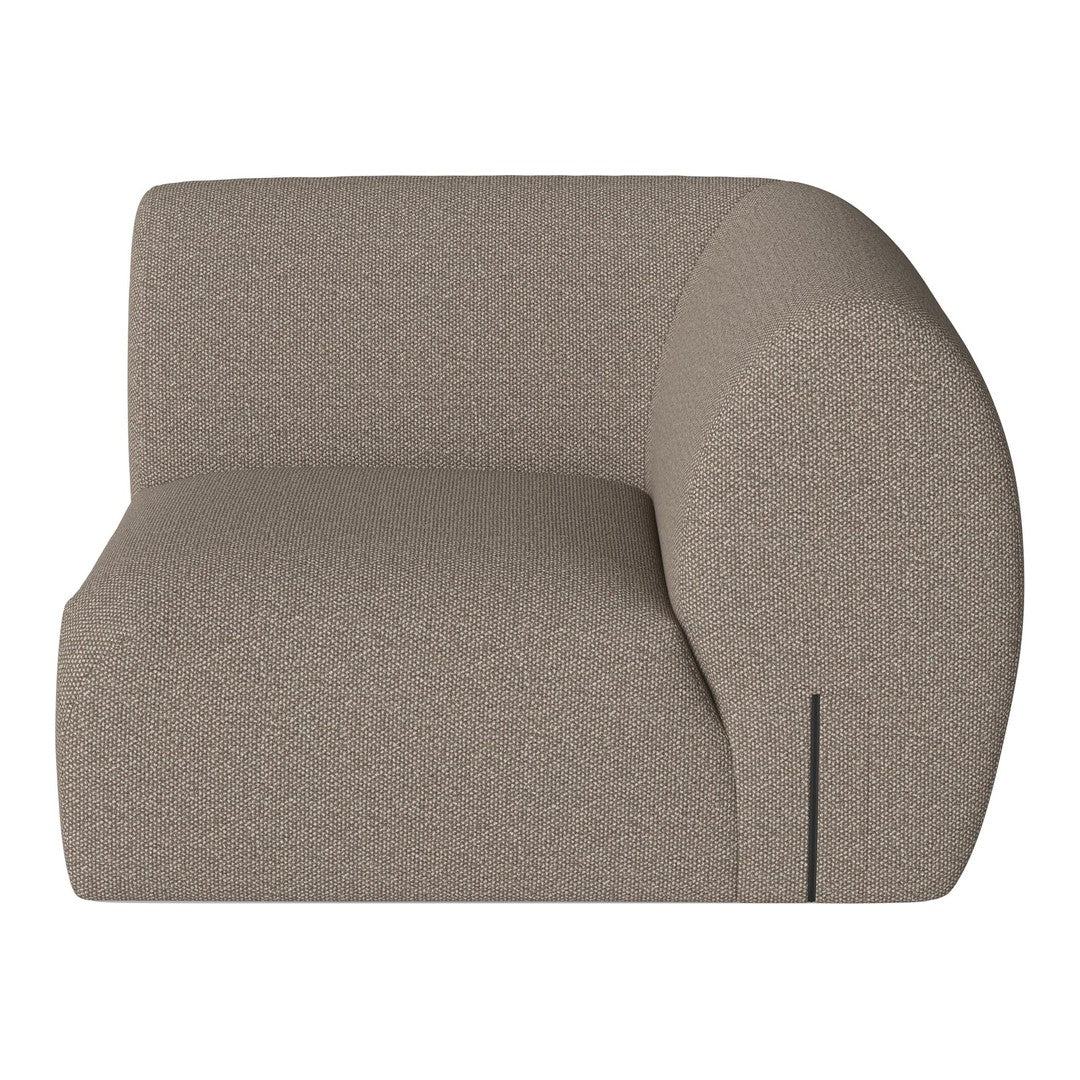 Contemporary beige sectional sofa with a textured, minimalist design and rounded edges, ideal for modern decor.