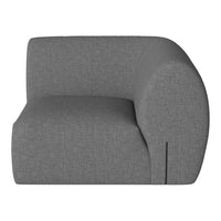Gray upholstered lounge chair with a smooth, curved shape and subtle textured pattern. Perfect for modern interiors.