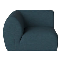 Teal upholstered chair with a textured pattern, featuring smooth curves and minimalist design. Perfect for modern decor.