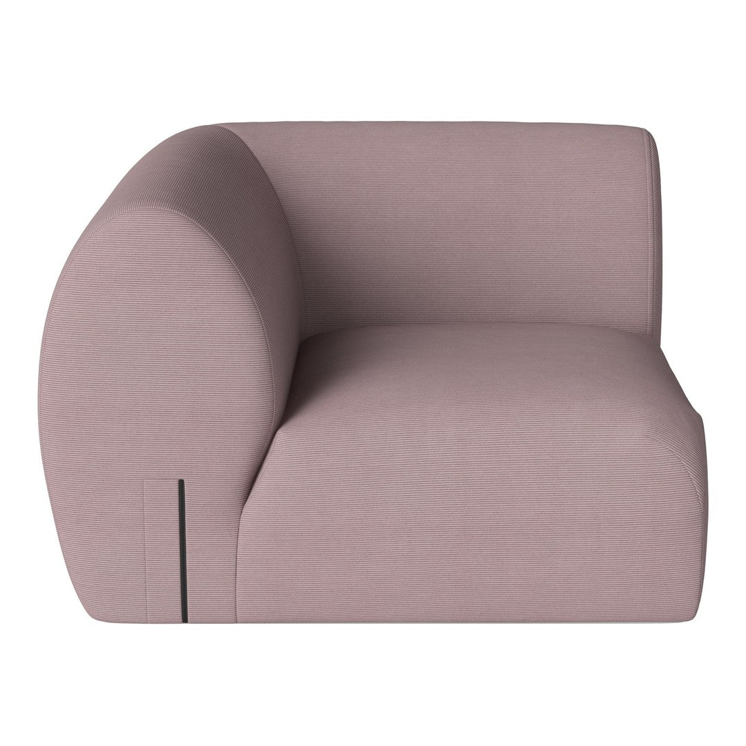 Light pink modern sofa with smooth curves and subtle textured pattern. Ideal for contemporary interior decor.